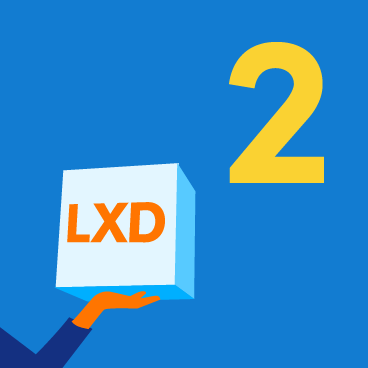 Number two with a hand holding a block with the text LXD on it.